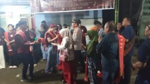 Kapolsek Talawi Hadiri Perayaan Pesta Gondang Naposo, Apresiasi Persatuan Antar Suku dan Agama   