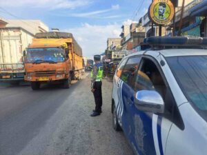 Satlantas Polres Batu Bara Lakukan Gatur Sore di Jalinsum Pajak Delima Indrapura – Kegiatan Aman Lancar   