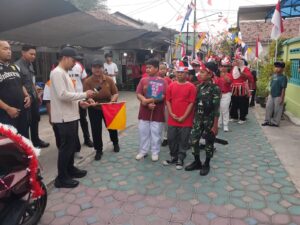 Babinsa Joyotakan Amankan Jalan Sehat Warga yang Dihadiri Wali Kota Surakarta   